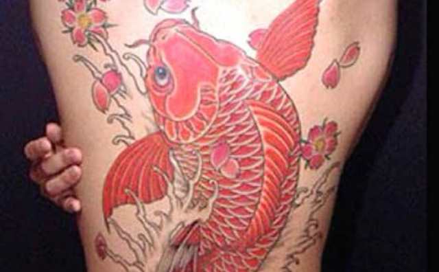 Tatouage carpe rouge signification